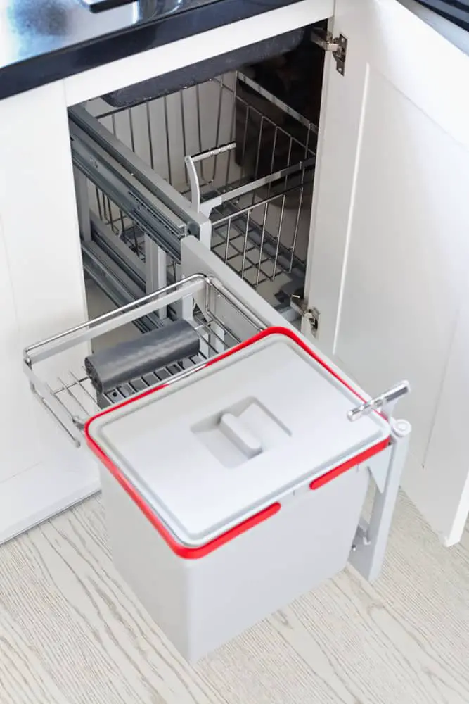 A Hide-Away Kitchen Trash Can kitchen cabinet hardware ideas