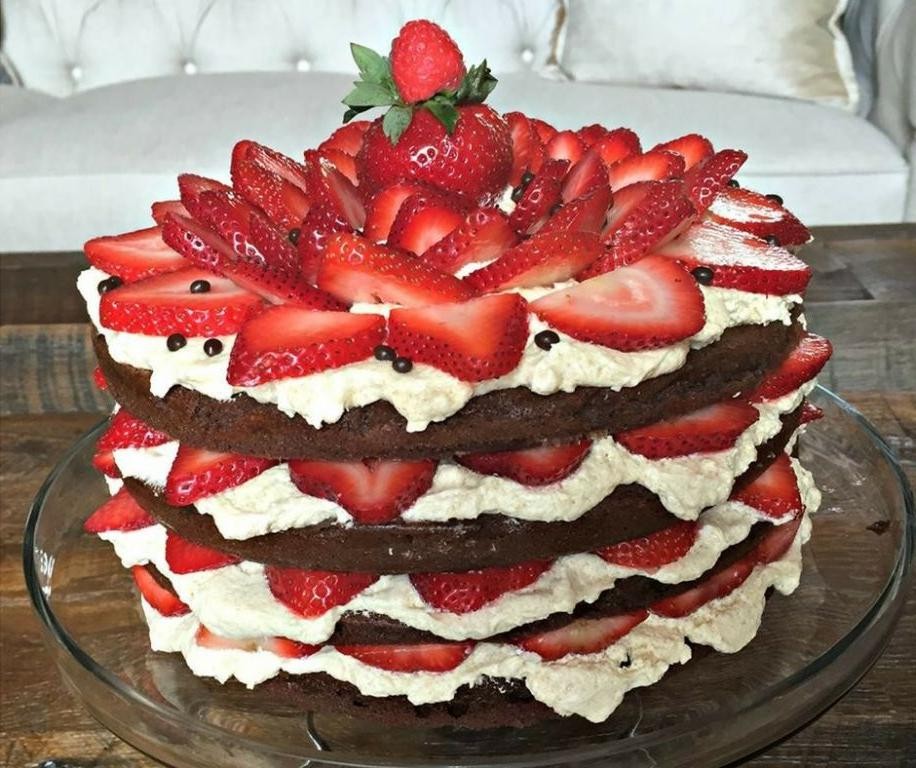 Chocolate Mud Cake with Whipped Cream and Strawberries