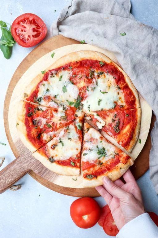 Homemade Pizza with Diced Tomatoes and Basil