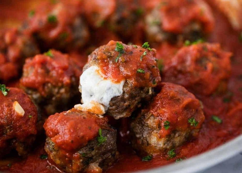 Oven Baked Meatballs with Mozzarella Stuffed Inside