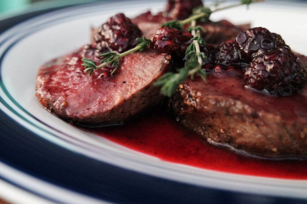 Pan-Seared Venison Backstrap with Blueberry Reduction
