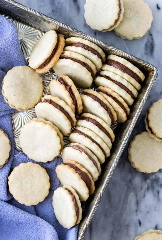 Black and White Sandwich Cookies with Vanilla and Chocolate Cream