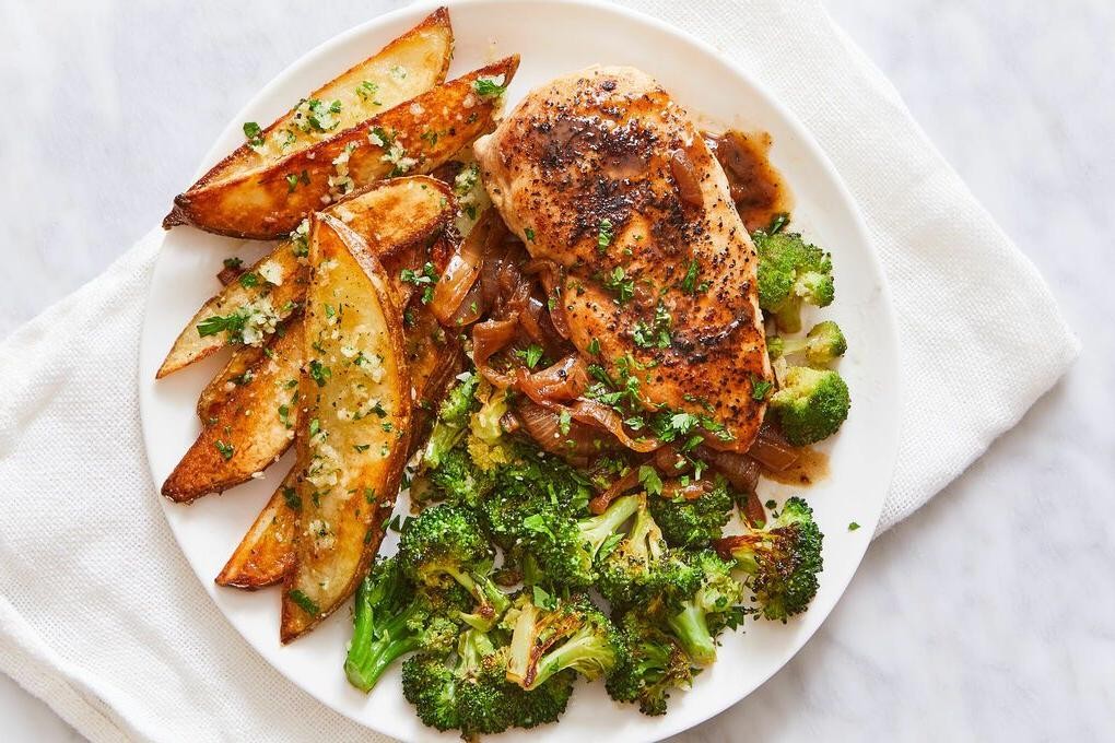Herb Roasted Chicken Breast with Potatoes and Caramelized Onions