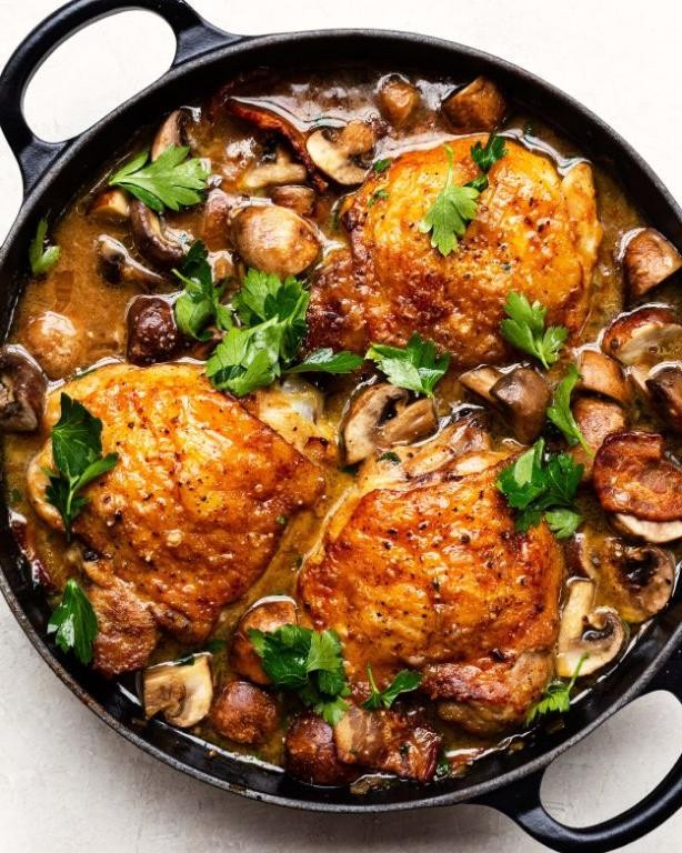 Keto Dutch Oven Chicken Thighs with Garlic and Herbs