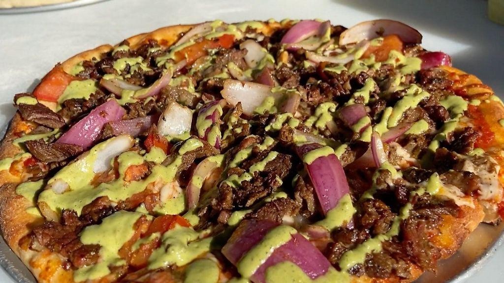 Lomo Saltado Pizza with a Crispy Crust
