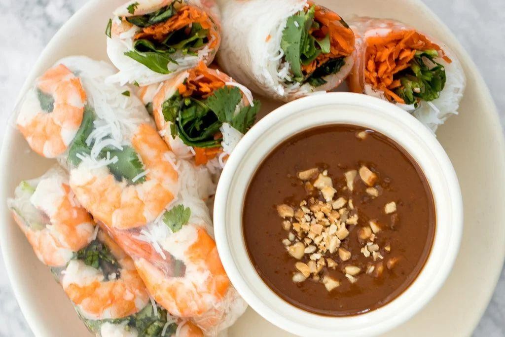 Lomo Saltado Spring Rolls with a Peanut Dipping Sauce