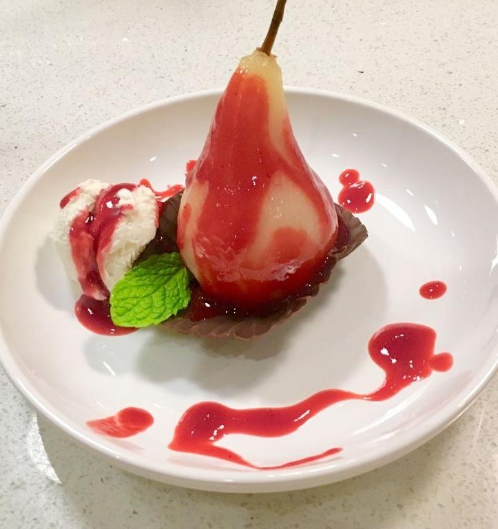 Poached Pears with Raspberry Coulis