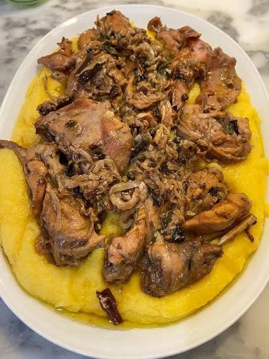 Rabbit Ragout over Creamy Polenta